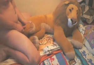 Dude fucking a plushie and covering it in cum